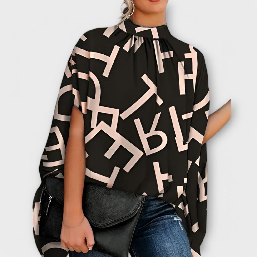 Lurdes- Blusa versátil