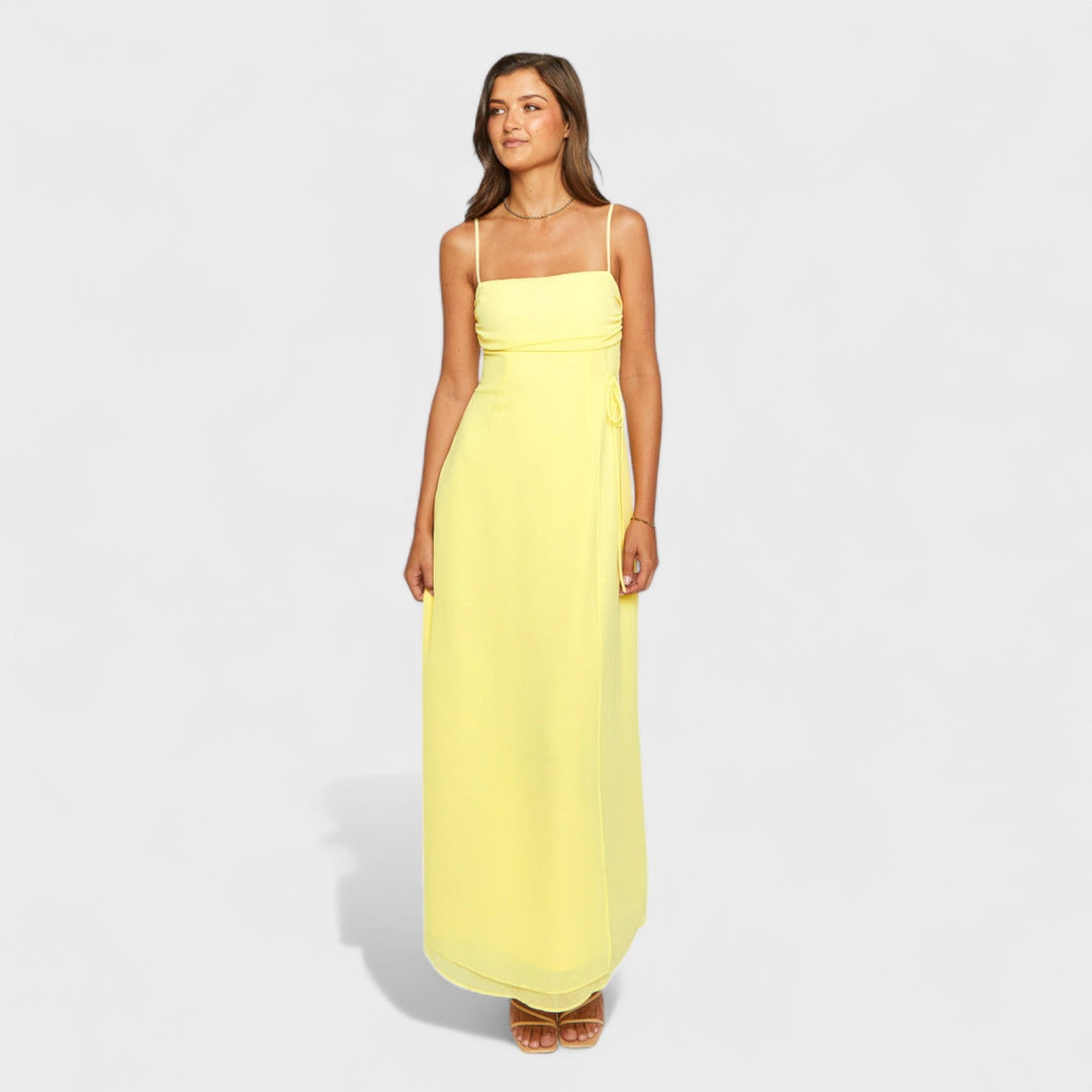 Flossie - Vestido maxi amarelo com laço lateral